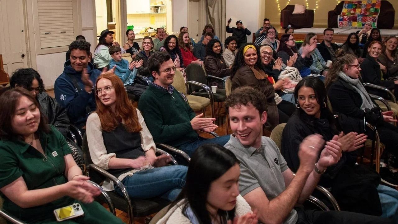 An audience seated at a Te Kāhui reading.